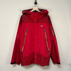 Arc'teryx Red Hooded Shell Jacket with Orange Zippers